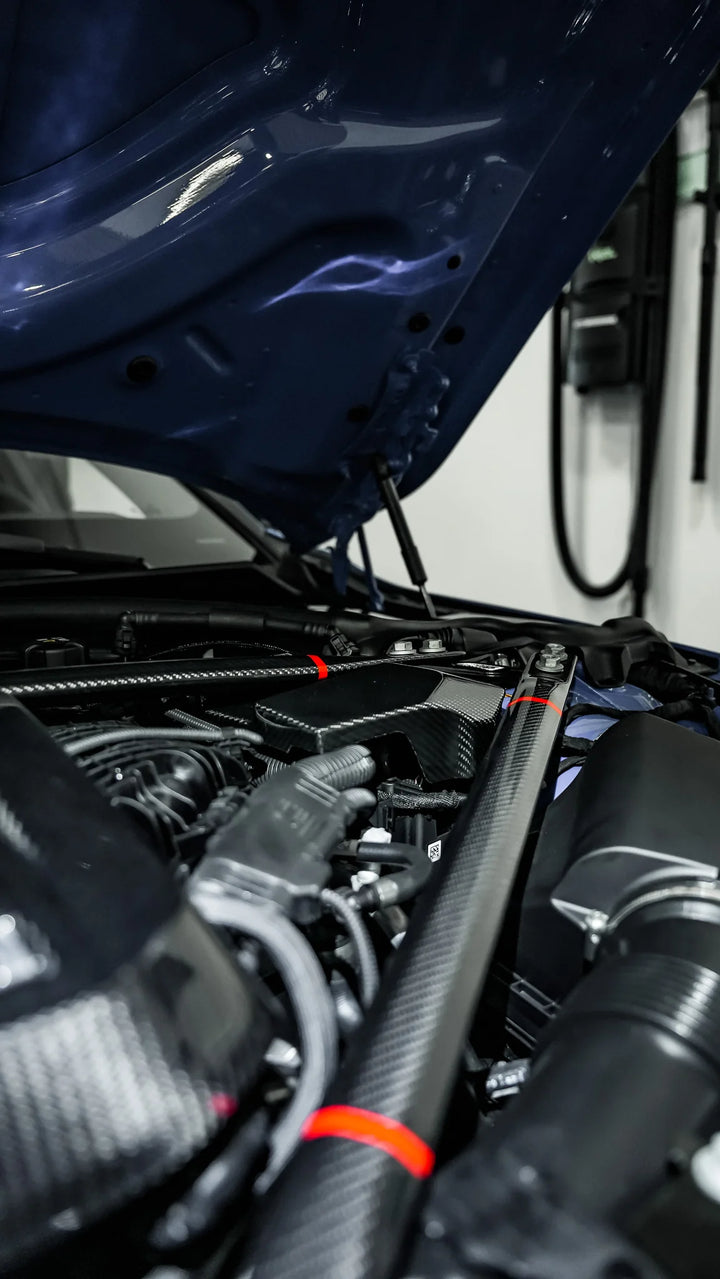 BMW G8X M3 - M4 ENGINE STRUT BRACE BAR DRY CARBON FIBER WITH RED STRIPE ACCENT