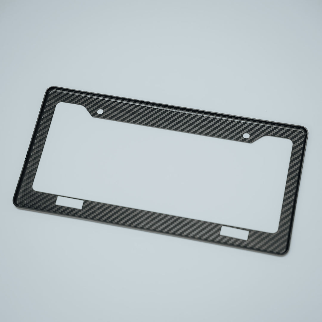 WBS | NOT YOUR ORDINARY. LICENSE PLATE FRAME GENUINE CARBON FIBER